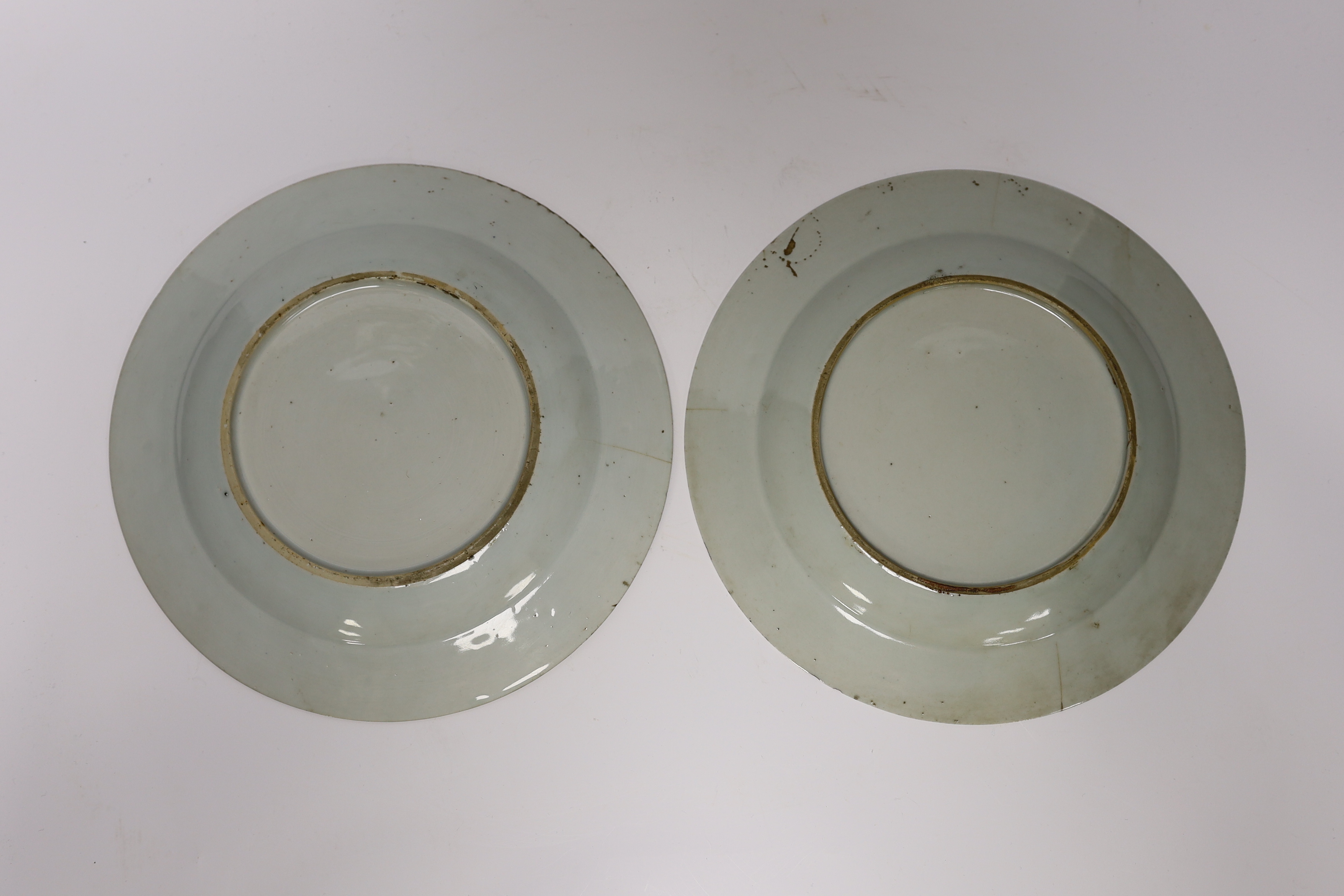 Three 18th century Chinese blue and white plates, 23cm in diameter